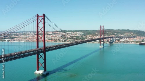 Flight over amazing 25 de Abril Bridge in Lisbon, Portugal
