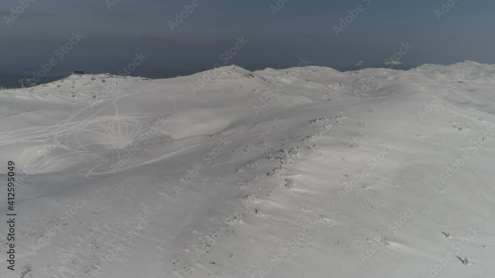 Aerial view of a frozen forest with fresh snow covered trees Aerial view of a frozen forest with fresh snow covered trees
