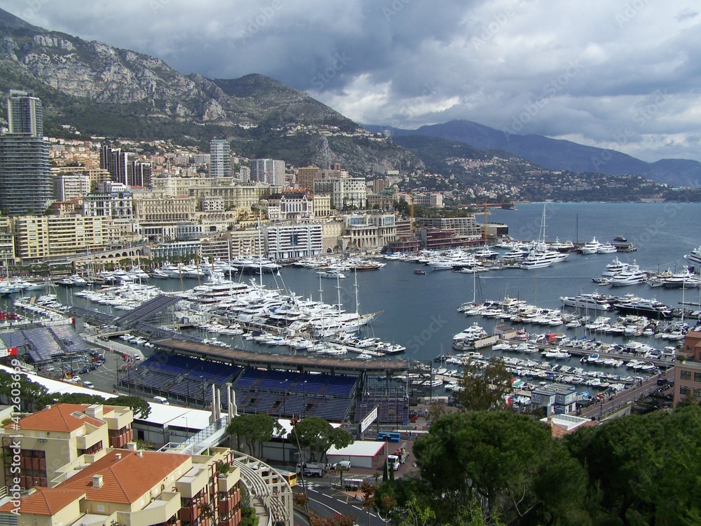 Skyline and old harbour of Monaco in front of the Maritime Alps
