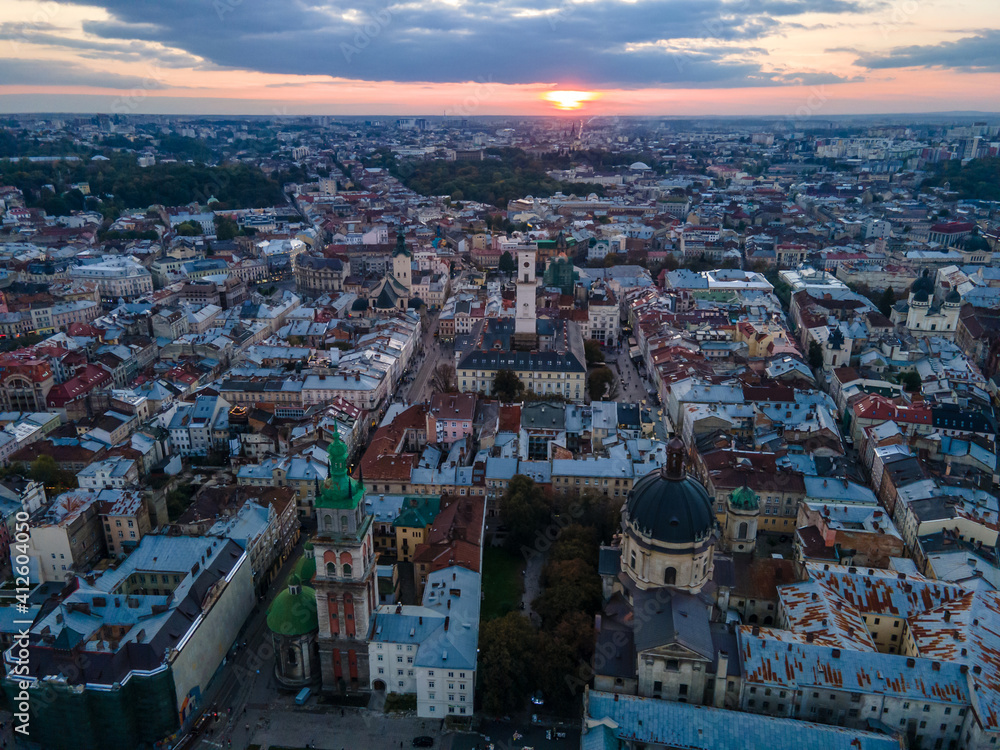 Fototapeta premium aerial view of sunset above the old european city