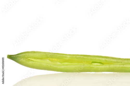 Pod of bright green, organic, natural, ripe beans on a white background.