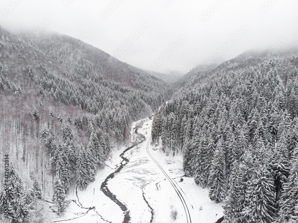 Fototapeta premium road during the winter time in the mountains 