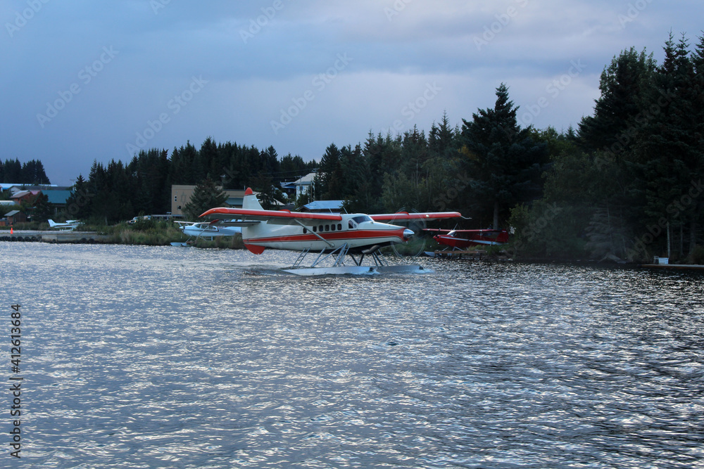 Obraz premium Seaplane at takeoff, Alaska