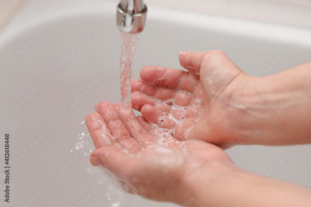 Fototapeta premium Hygiene. Cleaning Hands. Washing hands on sink.