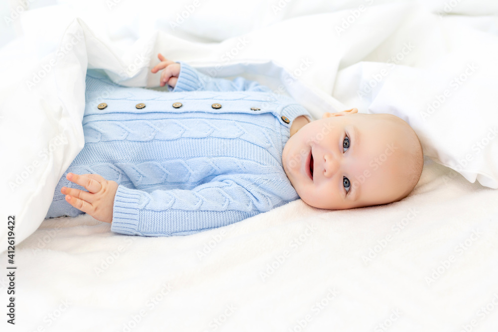 baby in a blanket, baby morning, textiles and baby bed baby in a blanket, baby morning, textiles and baby bed