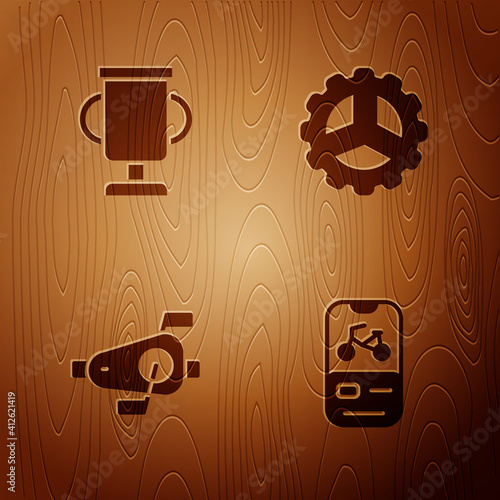 Set Bicycle rental mobile app, Award cup with bicycle, pedals and sprocket crank on wooden background. Vector.