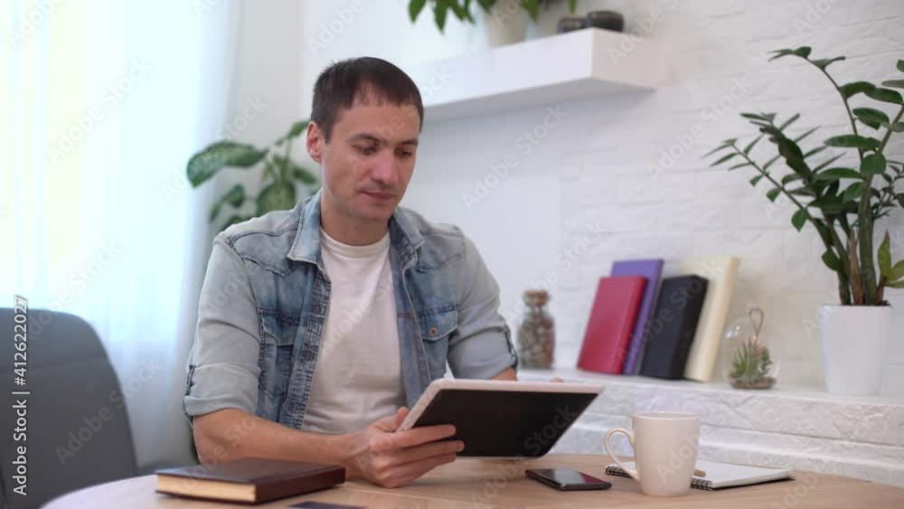 Businessman making video call, looking at camera and talking, discussing strategy with partners online, millennial business coach mentor recording webinar, hr manager holding distance job interview Businessman making video call, looking at camera and talking, discussing strategy with partners online, millennial business coach mentor recording webinar, hr manager holding distance job interview