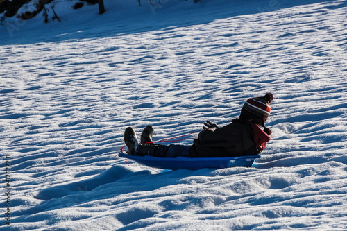 Canvas Print Child tobogganing