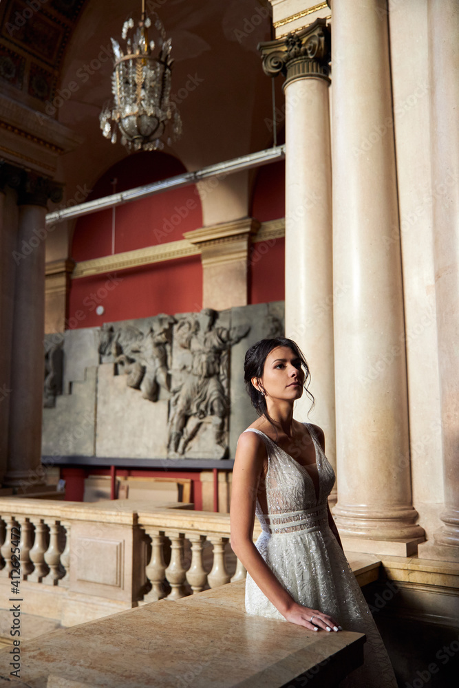 Fototapeta premium woman in a dress in the church