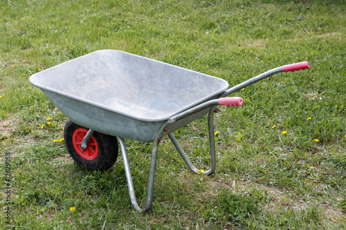 Garden wheelbarrow close-up. Garden trolley.
