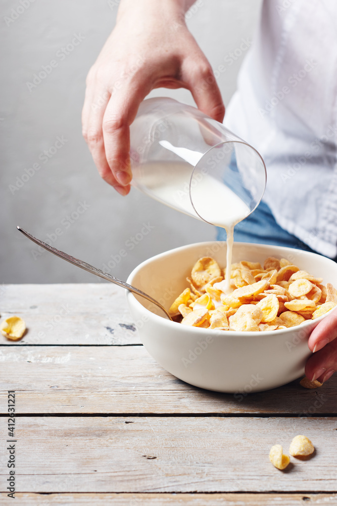 A bowl of breakfast cereals and milk. A bowl of breakfast cereals and milk.