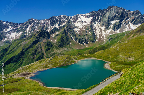Fototapeta Naklejka Na Ścianę i Meble -  Passo Gavia, mountain pass in Lombardy, Italy, to Val Camonica at summer. Lake