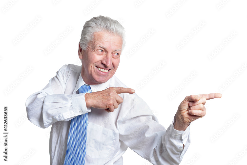 close up portrait of senior businessman in formal wear pointing to the right close up portrait of senior businessman in formal wear pointing to the right