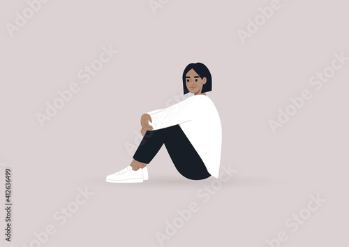 A young female character sitting on the floor and hugging their knees, casual daily life scene