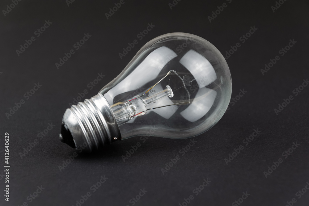 light bulb on a black background light bulb on a black background