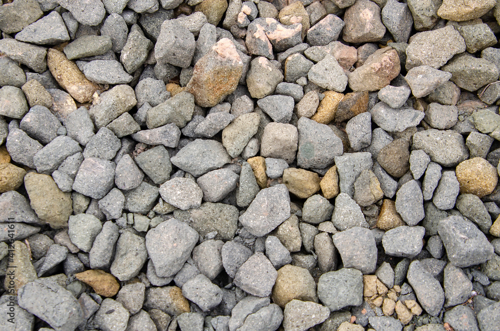 Textured background for designs, made with stones Textured background for designs, made with stones