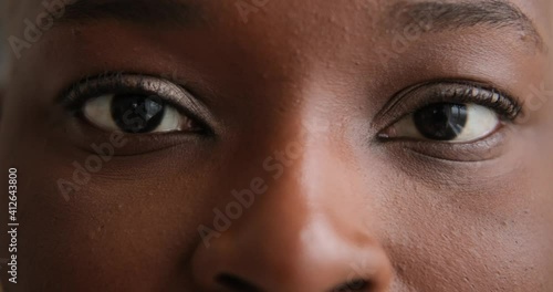 Close up of woman blinking her eyes photo