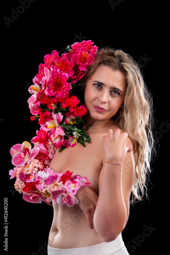 Fototapeta Naklejka Na Ścianę i Meble -  Adult young woman with arm covered in flowers