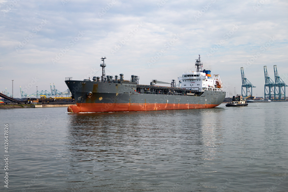 Harbor tug and oil tanker
