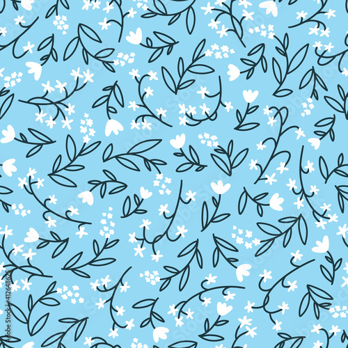Floral seamless vector pattern with small flowers. Simple hand-drawn style. Motifs scattered liberty. Pretty ditsy for fabric, textile, wallpaper. Digital paper in blue background.