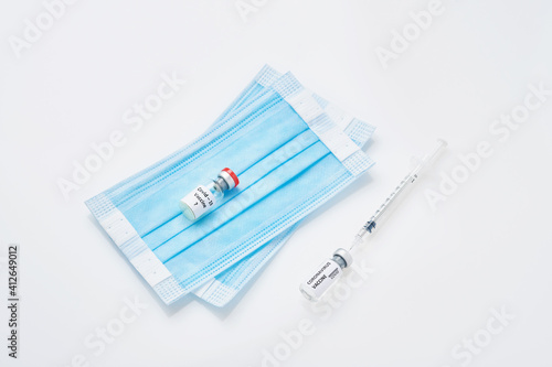 Coronavirus prevention vaccine  medical protective mask isolated on white background. Disposable surgical face mask cover mouth and nose. Healthcare medical Coronavirus quarantine.