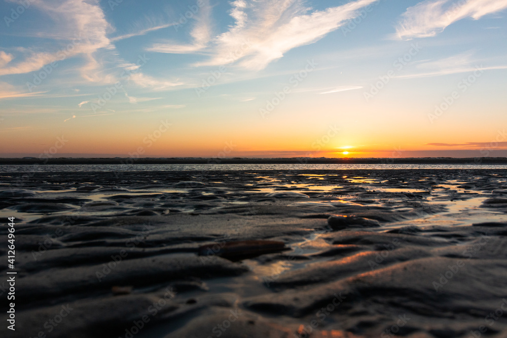 Fototapeta premium Beautiful Sunset at the Beach in the Netherlands.