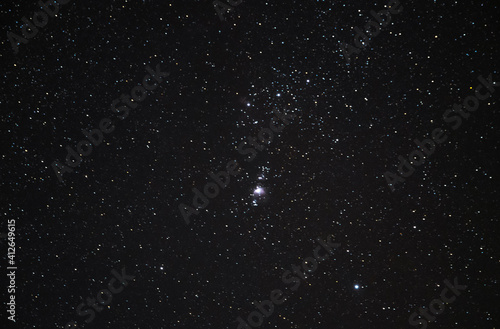 Winter starry sky and orion galaxy. Night photography, astronomical background.