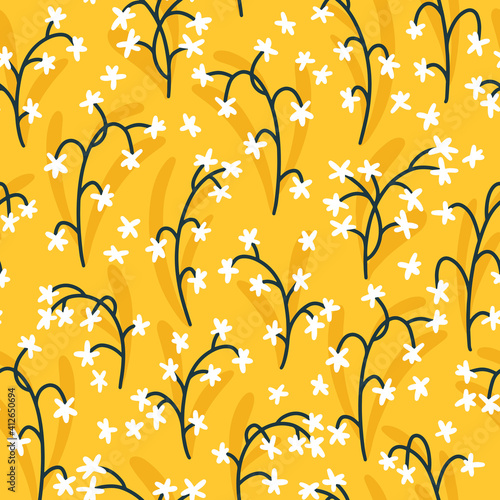Floral seamless vector pattern with small flowers. Simple hand-drawn style. Motifs scattered liberty. Pretty ditsy background for fabric, textile, wallpaper. Digital paper in yellow color