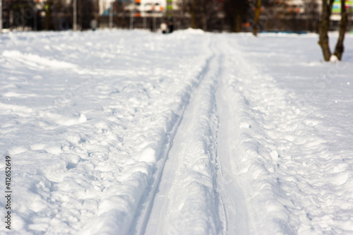 well-worn ski track in the city park