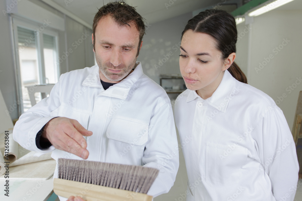 Obraz premium construction workers plasterers working indoors