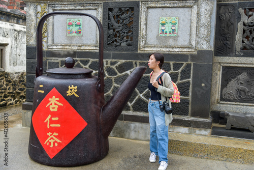 Taiwan girl tourist in Erkan Historic Village photo