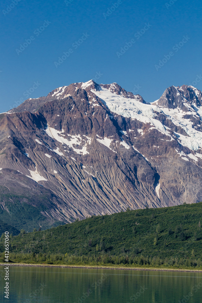 Snow capped Alaskan mountains near John Hopkins Glacier.jpg