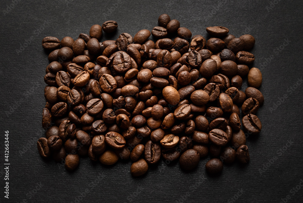 Rectangle made of roasted coffee beans on dark background Rectangle made of roasted coffee beans on dark background
