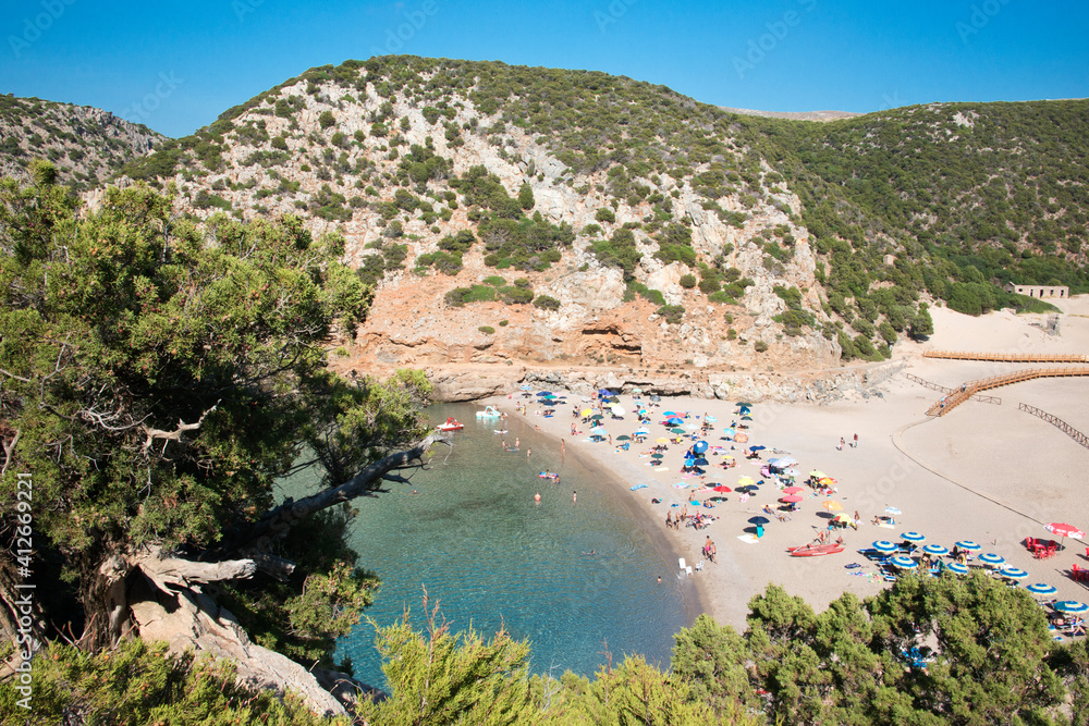 crystal clear and tropical water at Cala Domestica beach