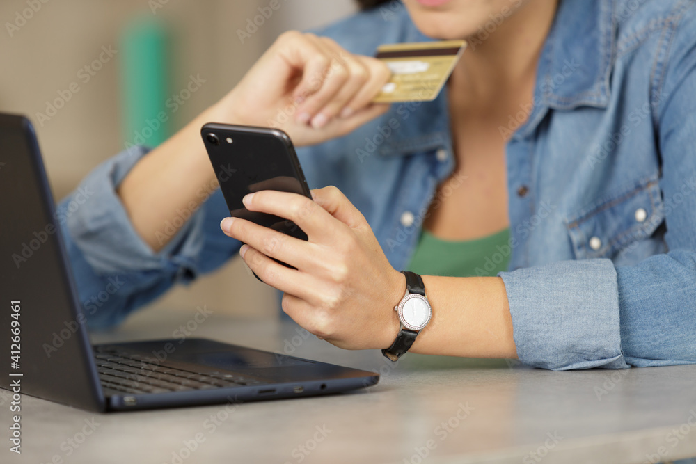 woman uses credit card to shopping online woman uses credit card to shopping online