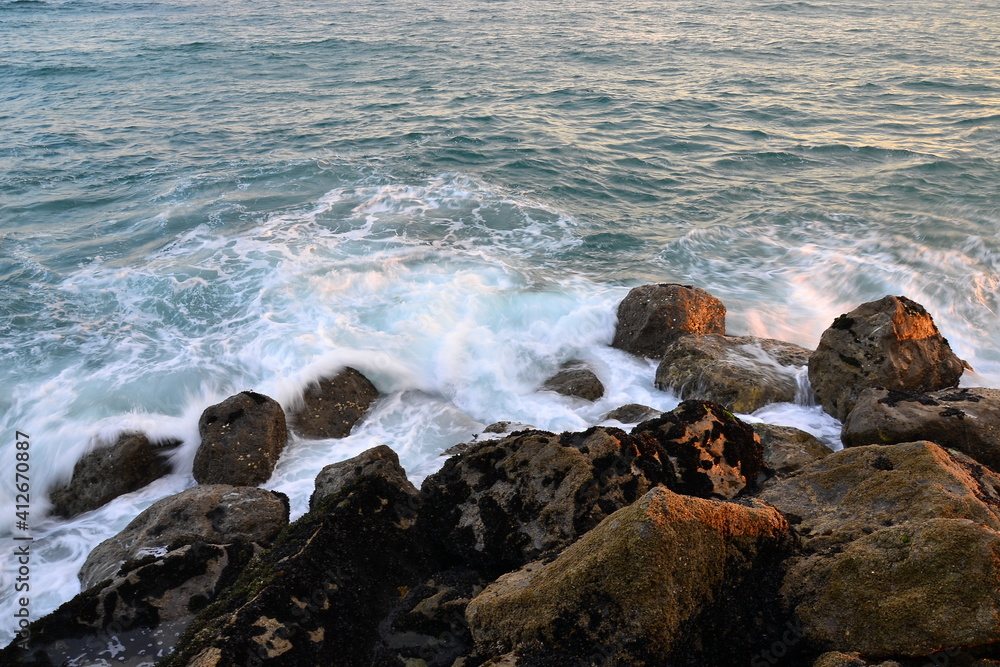 Colorful splash of waves close-up in the mediterranean sea. Colorful splash of waves close-up in the mediterranean sea.