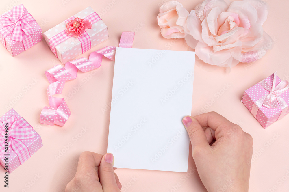 Blank card mockup in female hand for Valentine's Day Blank card mockup in female hand for Valentine's Day