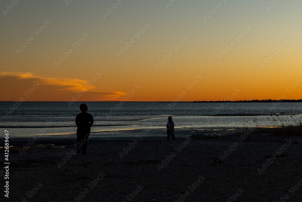 Walking at sunset near the ocean. Walking at sunset near the ocean.