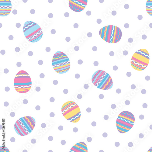 Tossed painted easter eggs with polka dot background.