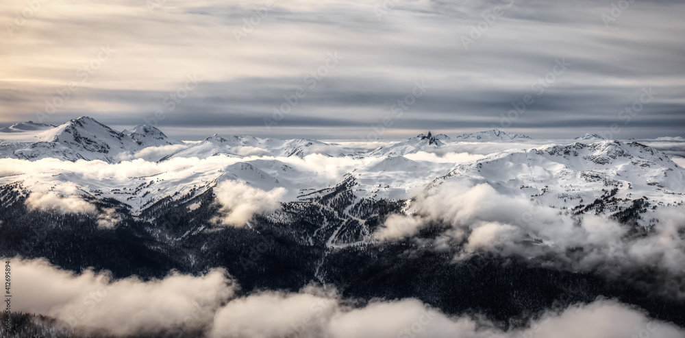 Beautiful Aerial Panoramic View of Whistler Mountain during a sunny winter day. Taken from Blackcomb Peak, Whistler, British Columbia, Canada. Canadian Nature Landscape Panorama