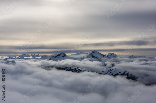 Whistler  British Columbia  Canada. Beautiful View of the Canadian Snow Covered Mountain Landscape during a cloudy and vibrant winter day.