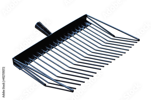 a gardening metal rake isolated on a white background