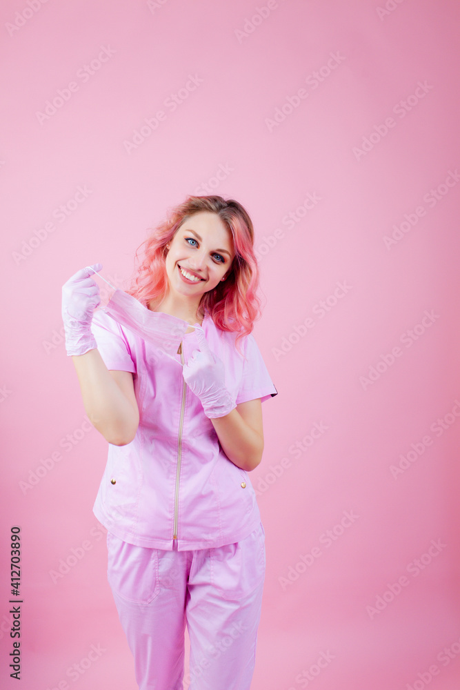 Experienced lady doctor removing her surgical mask Experienced lady doctor removing her surgical mask