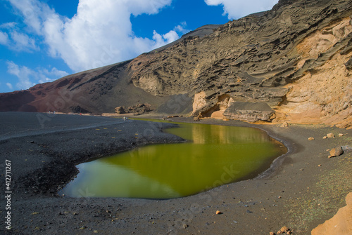 Green lagoon of El Golfo or Lago Verde on Lanzarote - a beautiful green lake near the village of El Golfo in Lanzarote, Canary islands, Spain