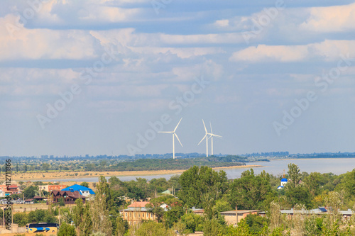 Wind turbines at Dzharylhach bay of the Black sea in Lazurne, Ukraine. Renewable energy photo