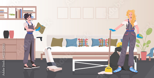 professional cleaners couple women janitors using cleaning equipment working together office interior full length horizontal vector illustration