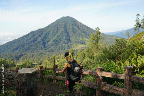 A Woman Walking Down From the top of Mount Ijen Banyuwangi Indonesia.