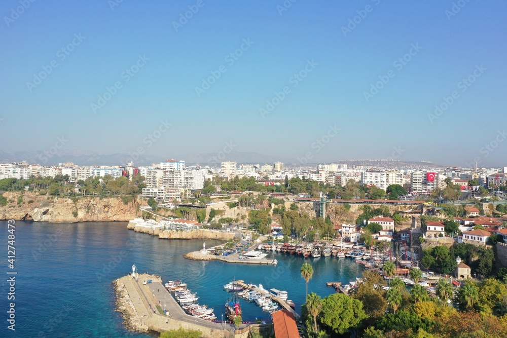 Yacht marina. The beautiful View of the city, yachts and marina in Antalya. Antalya is popular tourist destination in Turkey is a district on the Mediterranean coast.  