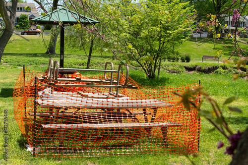 A park bench is sealed off to prevent the spread of Covid-19