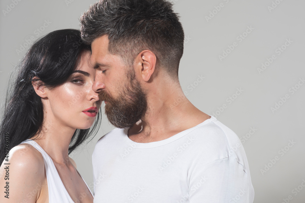 Couple in tender passion. Closeup each other of lovely pair. True love. Man with woman in relationships. Couple in tender passion. Closeup each other of lovely pair. True love. Man with woman in relationships.